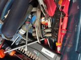 many tools in a blue container that is full of them