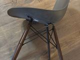 a chair that is sitting on a wooden floor