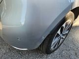 a close up of a car ' s rear bumper