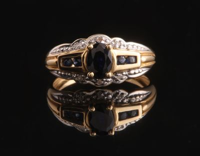 Bague jonc en or à plusieurs tons jaune et blanc, agrémenté de saphirs - Photo 1