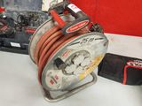 une image représentant une bobine sur laquelle est enroulée une corde