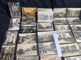 several old black and white photos of a bunch of buildings