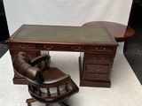 an image of a desk with a chair and a desk top