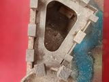 a piece of metal that has been cut in half
