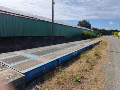 a train that is sitting on the side of the road