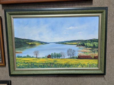 a picture of a painting hanging on the wall of a room