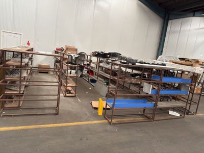 a room with a lot of tables and chairs in it