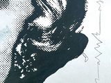 a drawing of a man ' s face on a piece of paper
