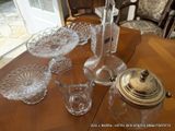 a table with a lot of glass items on it