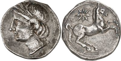 a silver coin with an image of a horse on it