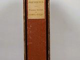 a brown book that is sitting on a table