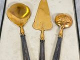 three different types of silverware in a box