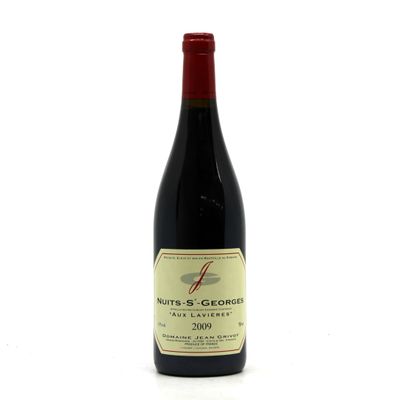 a bottle of wine that is sitting on a table