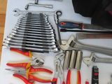 a lot of tools that are laying out on the table