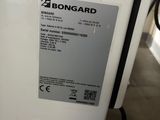 a white refrigerator with a sticker on the side of it