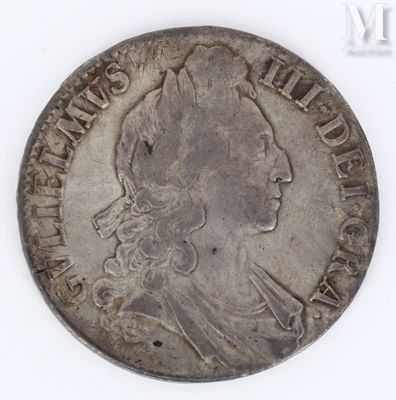 a close up of a coin on a white surface