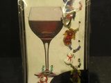 a picture of a glass of wine on a table
