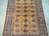 a rug with a pattern on it is laying on the floor