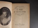 an open book with a picture of a woman in a dress on it