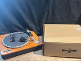 a box with a record player and a box with a record on it