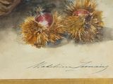 a painting of two chestnuts on a table