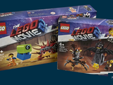 two boxes of lego movie sets on a blue background