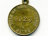 une image représentant une médaille sur laquelle figure la date de la bataille de la Somme