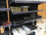 a shelf with many items in it in a store