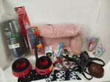 many items that are sitting on a shelf in the room