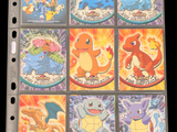 a lot of pokemon cards on a binder