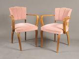 pair of art deco armchairs with pink velvet upholstered seats