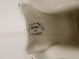 a close up of a statue of a person with writing on it