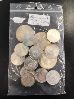 a bag full of coins sitting on a table