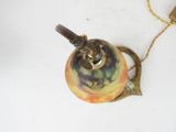 a small lamp that is on a table with a cord