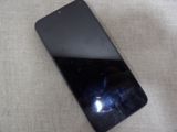 a cell phone that is laying on a table