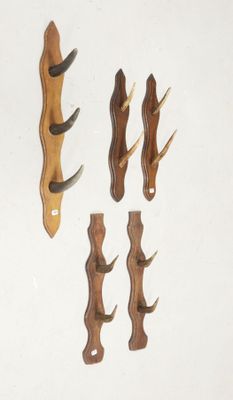 four pieces of wood with antelope on them