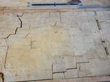 a piece of wood that has been cut in half and is laying on the floor