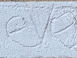 a picture of a close up of a sign on a wall