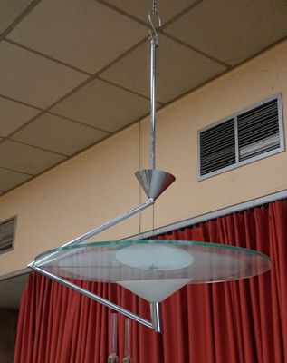 a light that is hanging from a ceiling in a room