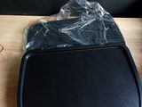 a plastic bag sitting on top of a table next to a laptop computer