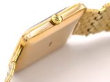 an image of a close up of a watch on a white surface