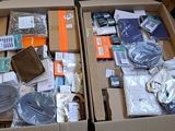 two boxes of electronics are stacked on top of each other