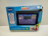 a blue box with a small electronic tablet inside of it