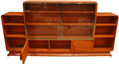 an image of a wooden bookcase with a glass door