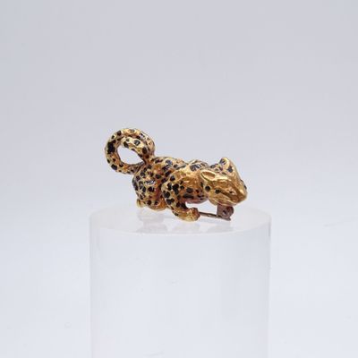 a close up of a figurine of a leopard on a pedestal