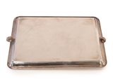 a silver tray with handles and handles on a white surface