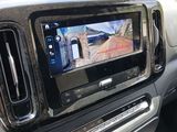 a picture of a car dashboard with a monitor in it
