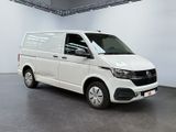 the white van is parked in a large room with a gray floor