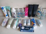 many different types of skin care products laid out on the counter