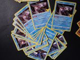 a lot of cards that are on the table